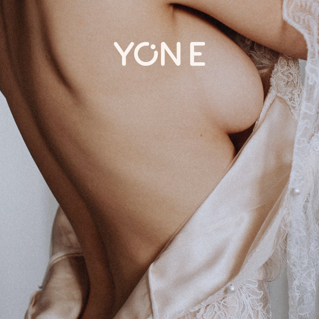 A woman taking off the nightgown