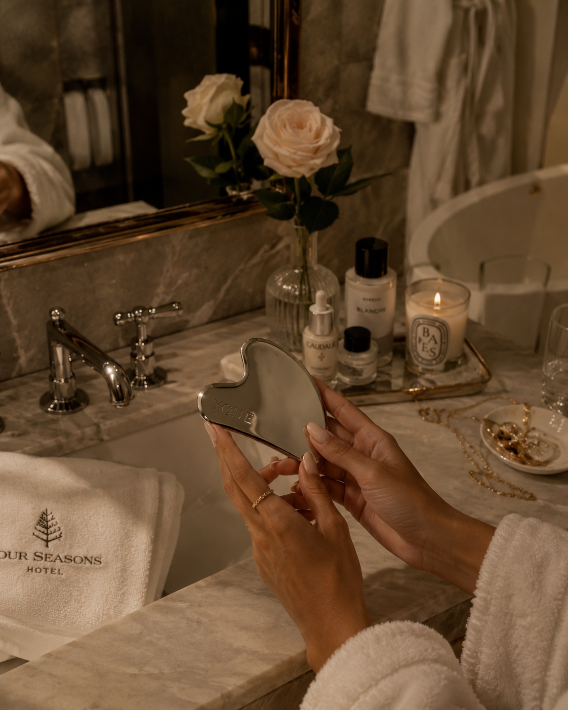 Womens_hands_with_gua_sha